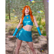 Female model (size C) posing in the Winx Club Bloom completed sewing pattern. Rainbow lens flares surround her, enhancing the fairy atmosphere.